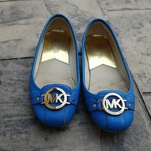 Blue michael Kors flats with gold logo